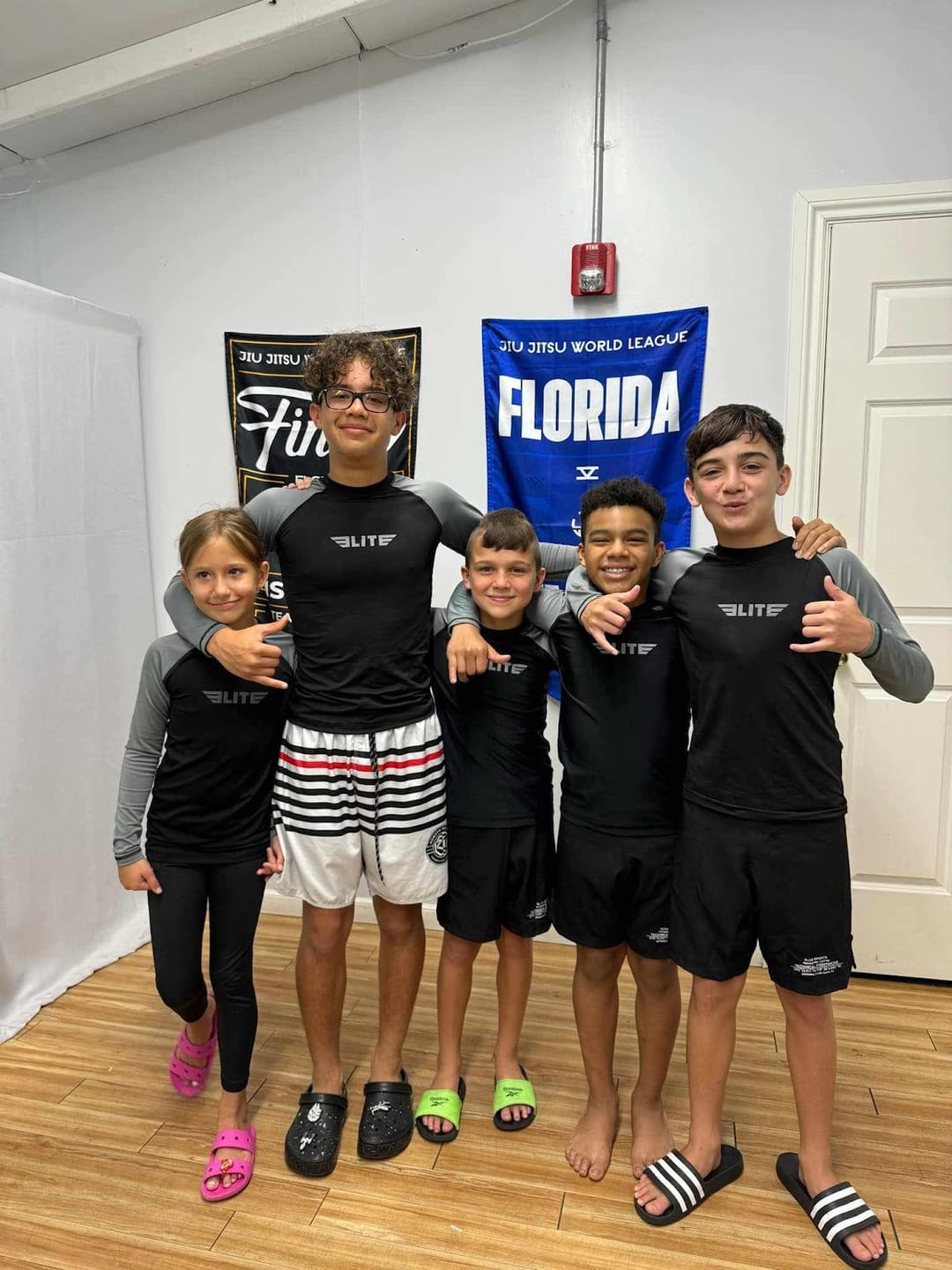 Customer photo review of Standard Gray Long Sleeve No-Gi Kids BJJ Rash Guard