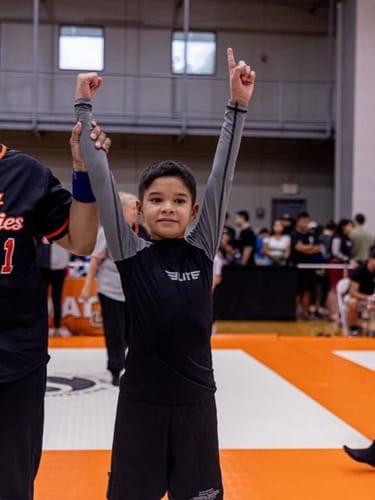 Customer photo review of Standard Gray Long Sleeve No-Gi Kids BJJ Rash Guard