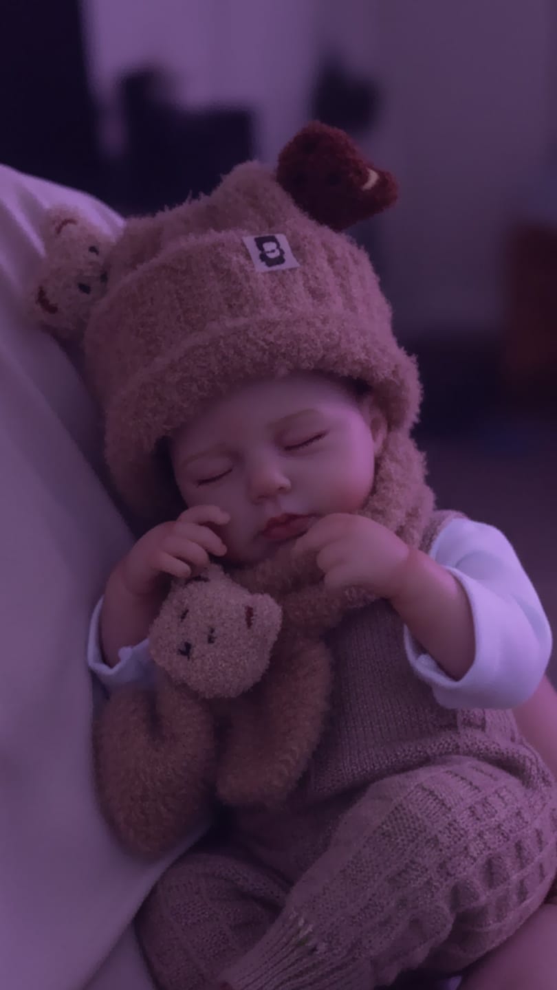 Customer photo review of Finn - Lifelike Sleeping Reborn Baby Doll (20")