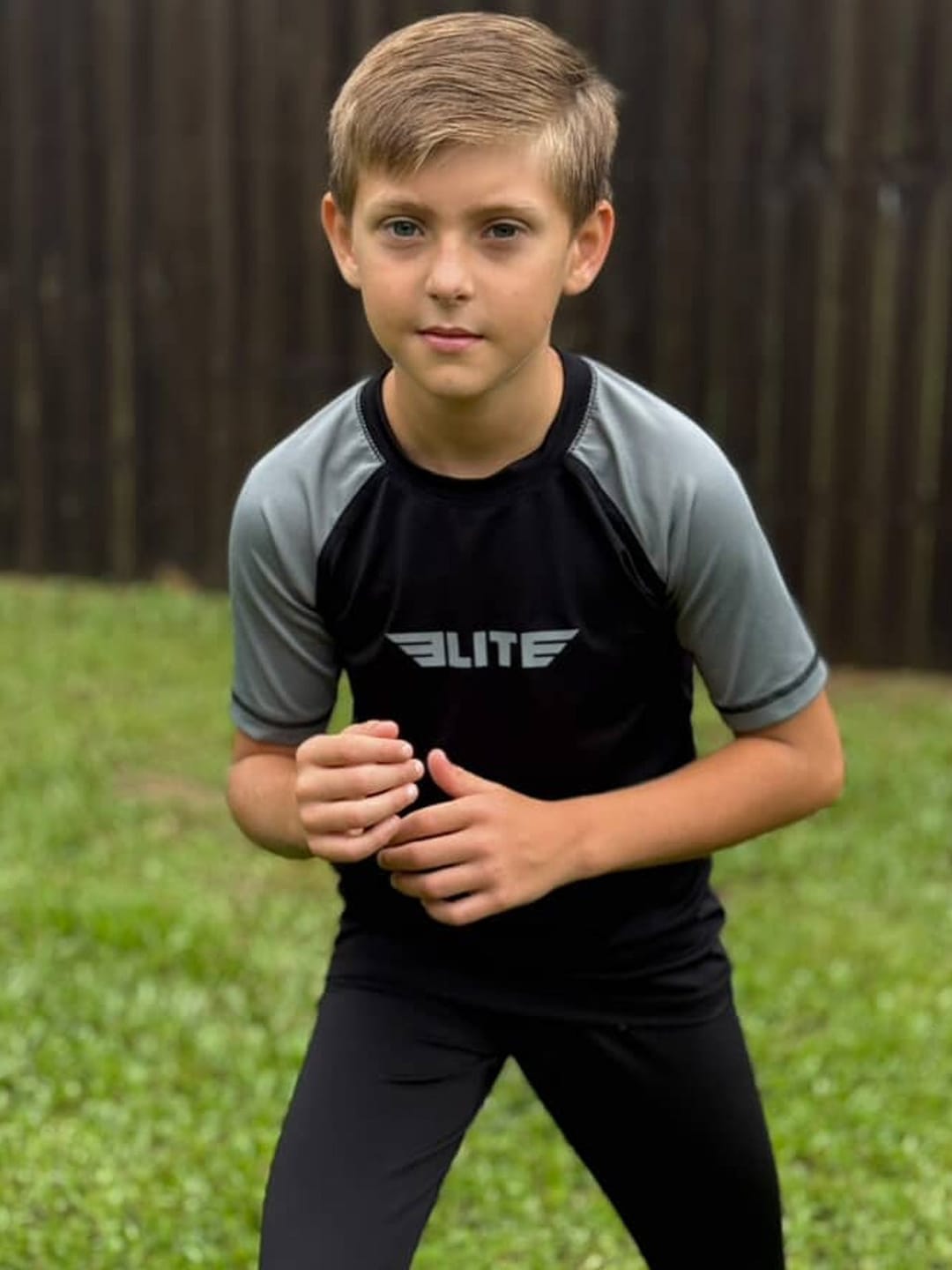 Customer photo review of Standard Gray Short Sleeve No-Gi Kids BJJ Rash Guard