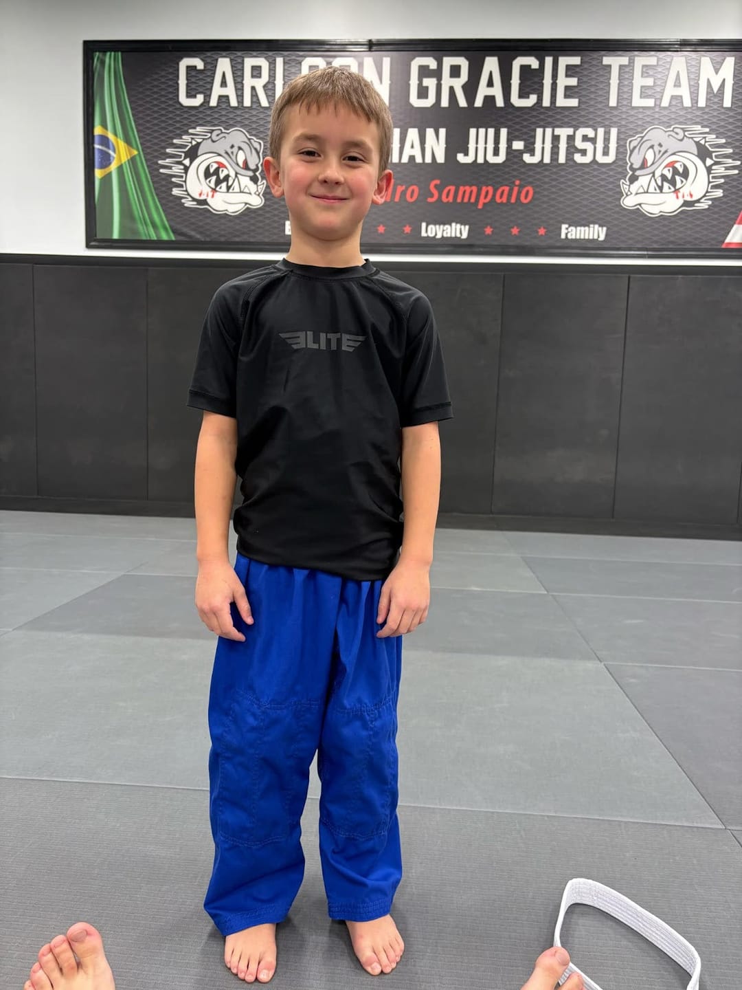 Customer photo review of Standard Black Short Sleeve No-Gi Kids BJJ Rash Guard