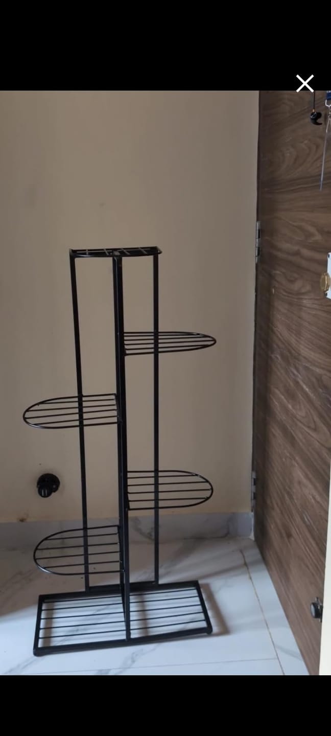 Customer photo review of 6-Tier Metal Plant Stand for 7 Pots – Indoor Outdoor Flower Shelf, Corner Planter Rack for Garden, Patio, Balcony & Living Room