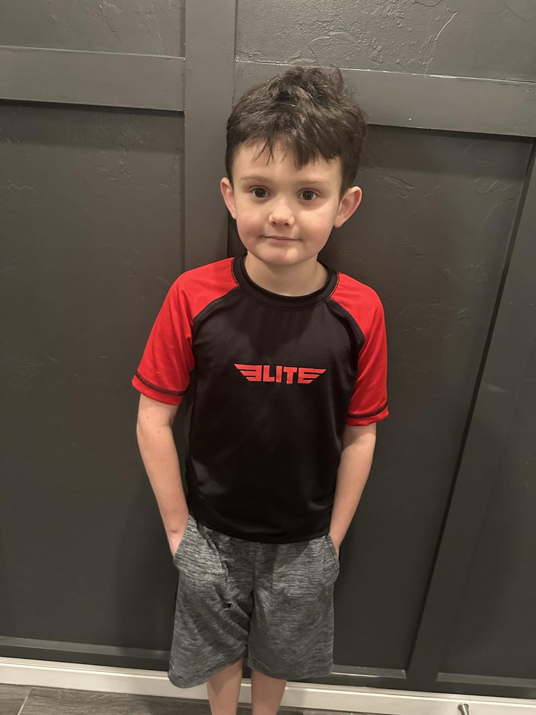 Customer photo review of Standard Red Short Sleeve No-Gi Kids BJJ Rash Guard