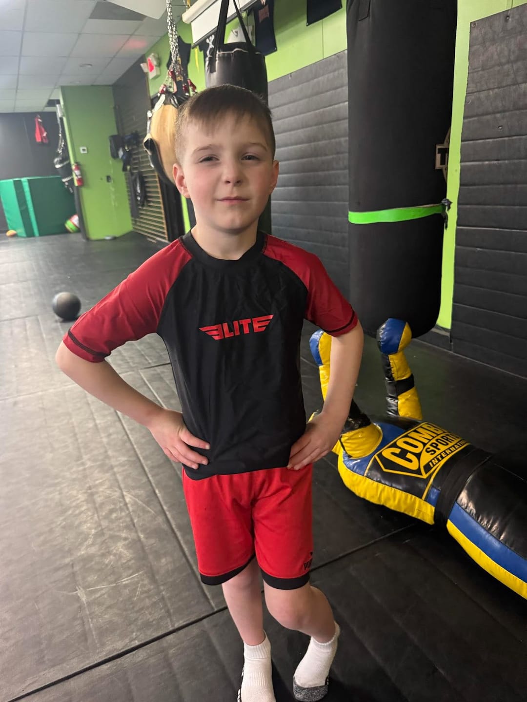 Customer photo review of Standard Red Short Sleeve No-Gi Kids BJJ Rash Guard