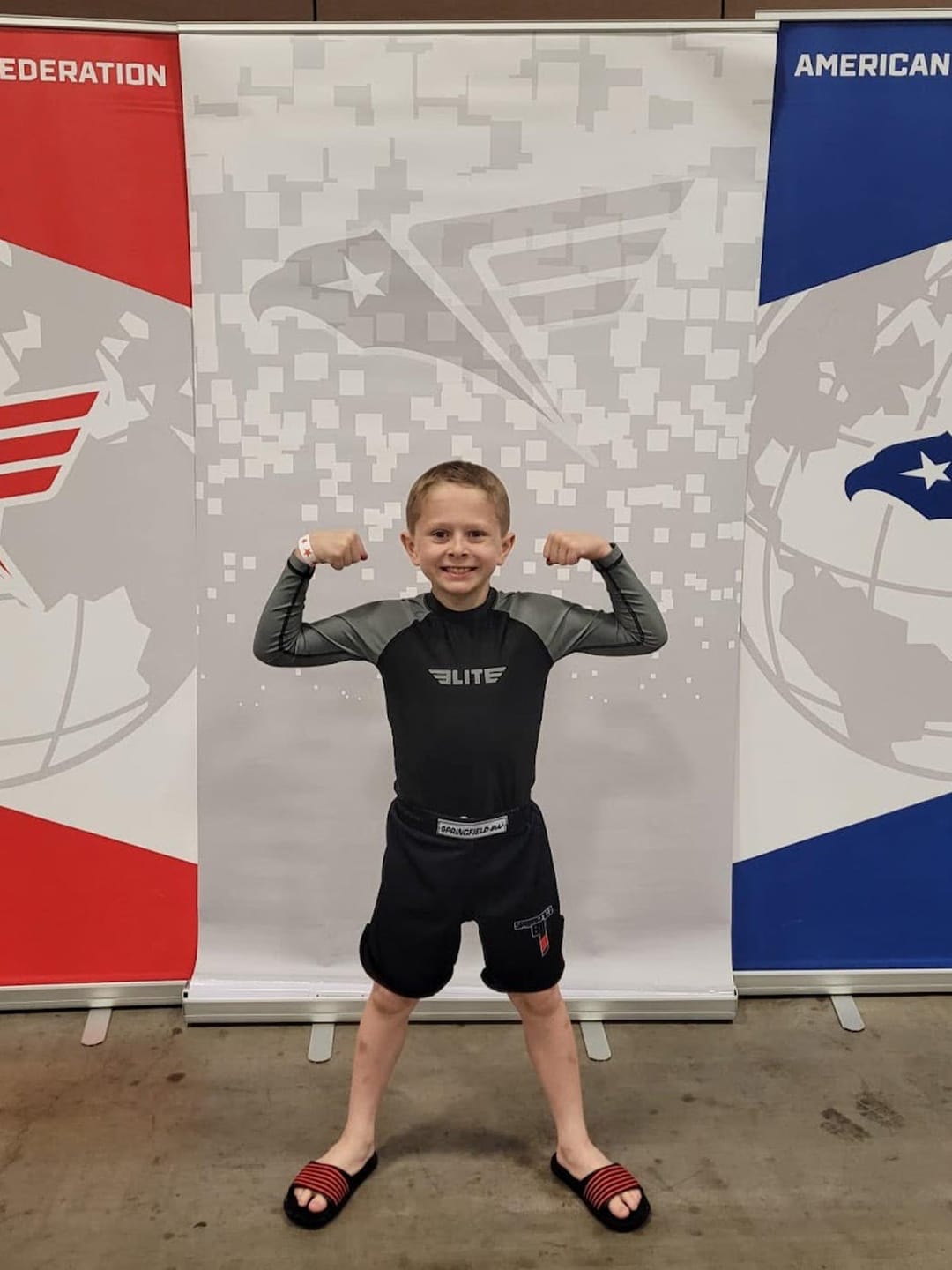 Customer photo review of Standard Gray Long Sleeve No-Gi Kids BJJ Rash Guard