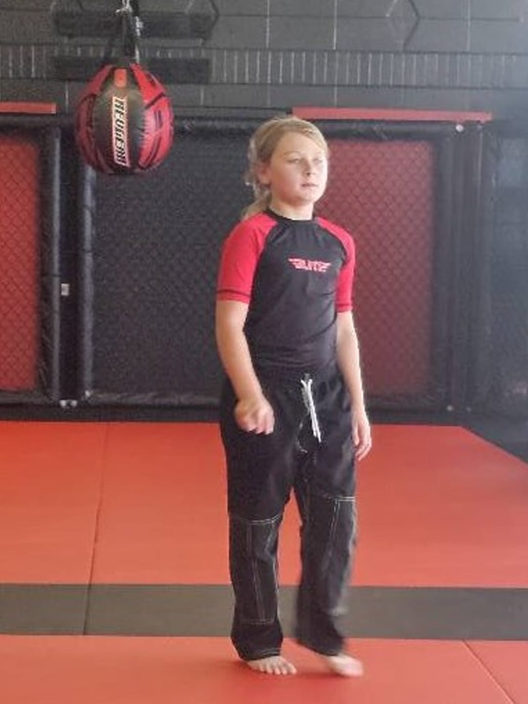 Customer photo review of Standard Red Short Sleeve No-Gi Kids BJJ Rash Guard