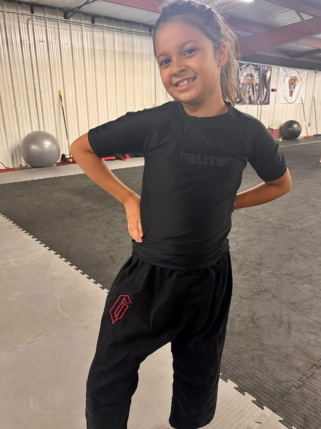Customer photo review of Standard Black Short Sleeve No-Gi Kids BJJ Rash Guard