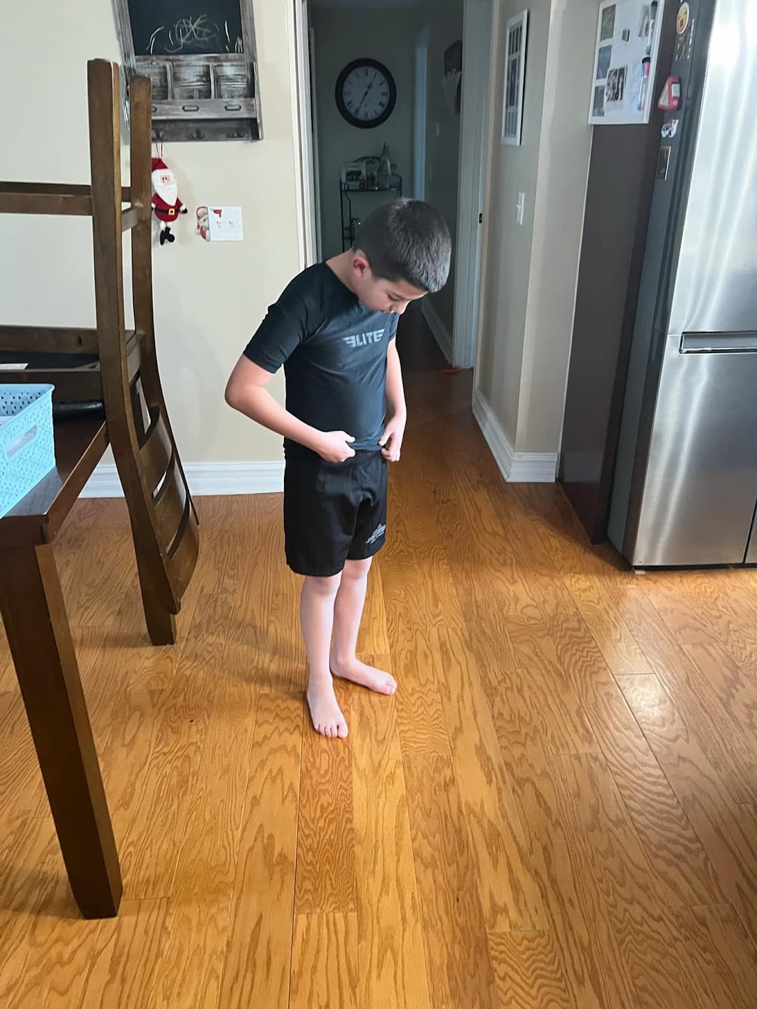 Customer photo review of Standard Black Short Sleeve No-Gi Kids BJJ Rash Guard