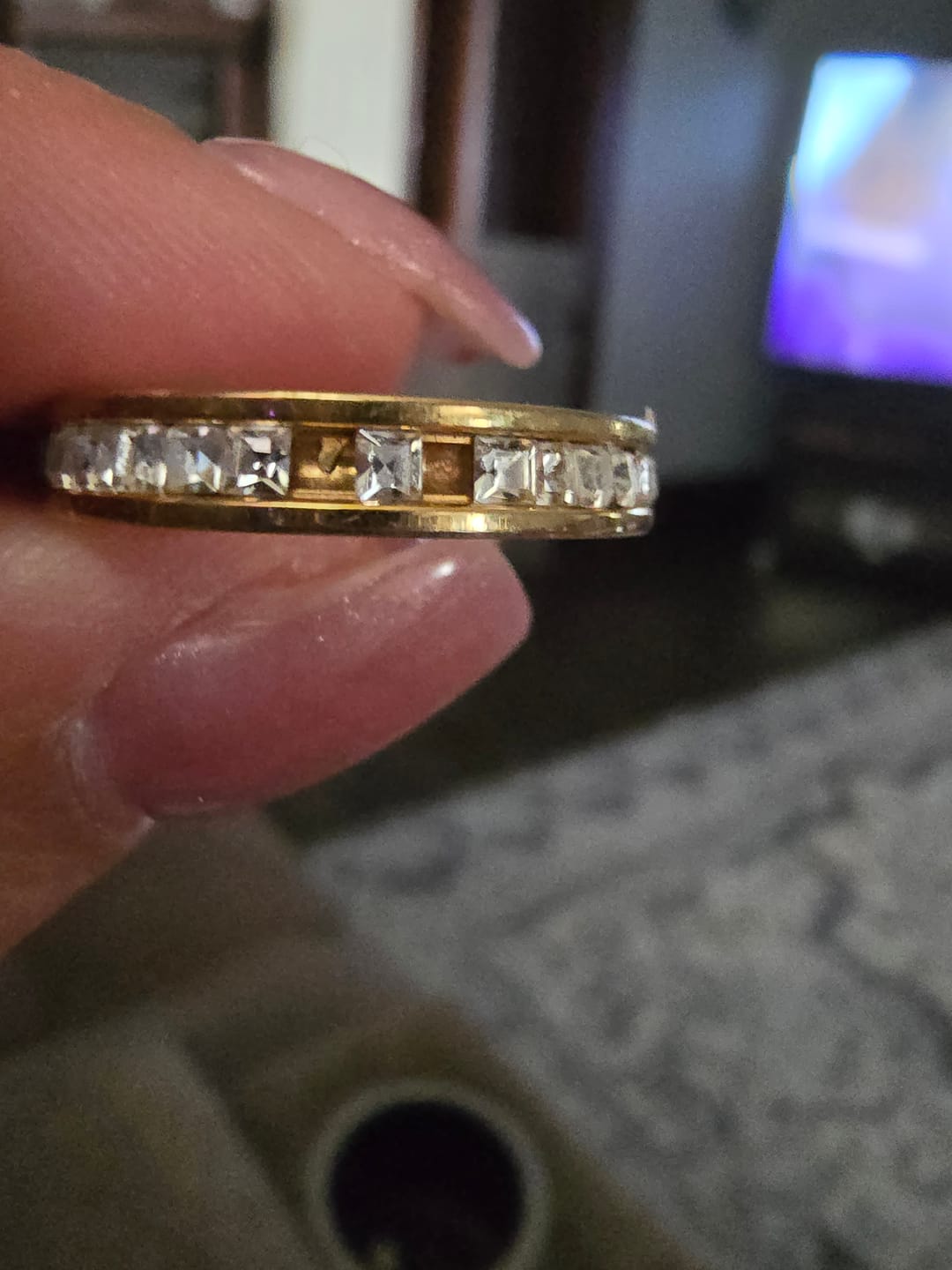 Customer photo review of 4MM 14k Gold Princess Cut Women's Eternity Titanium Ring Wedding Band with CZ