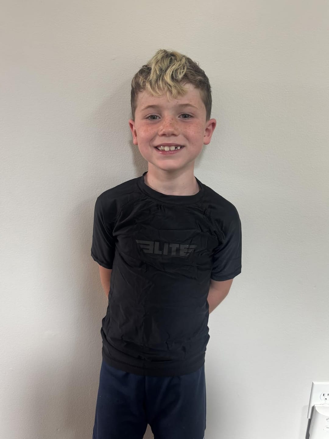 Customer photo review of Standard Black Short Sleeve No-Gi Kids BJJ Rash Guard