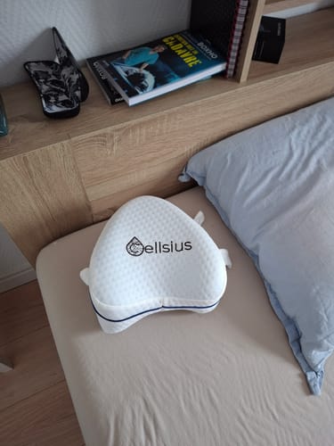 Avis photo d'un client sur Coussin Orthopédique Genoux Cellsius - Le secret d'un sommeil sans douleur