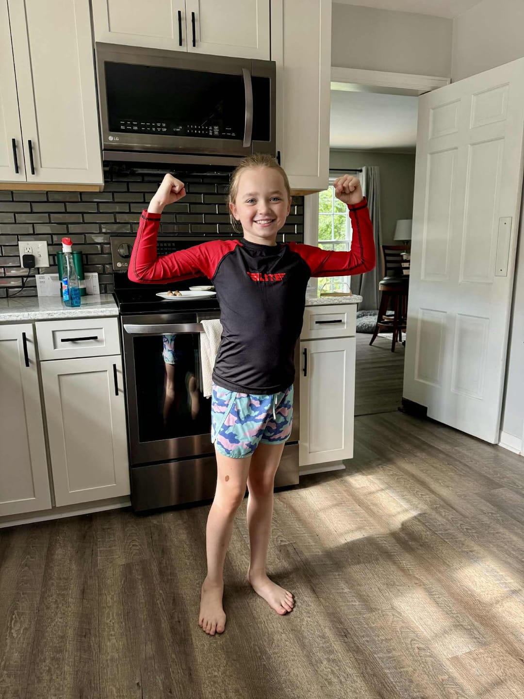 Customer photo review of Standard Red Long Sleeve No-Gi Kids BJJ Rash Guard