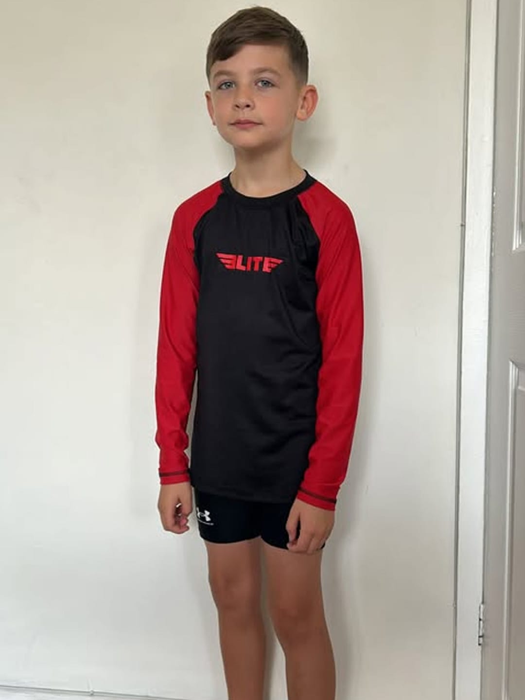 Customer photo review of Standard Red Long Sleeve No-Gi Kids BJJ Rash Guard