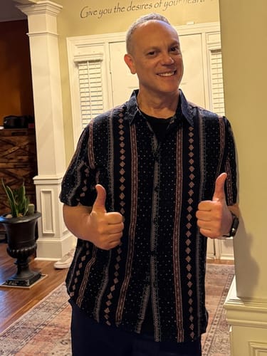 Customer photo review of Men's Retro Button Up Short Sleeve Cotton 70s Shirt