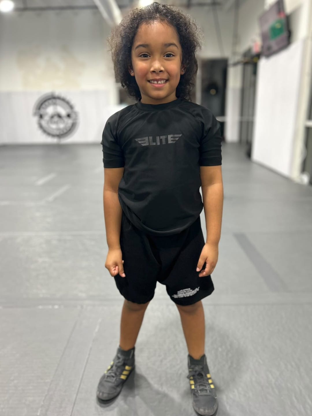 Customer photo review of Standard Black Short Sleeve No-Gi Kids BJJ Rash Guard