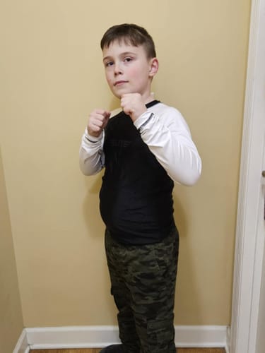 Customer photo review of Standard White Long Sleeve No-Gi Kids BJJ Rash Guard