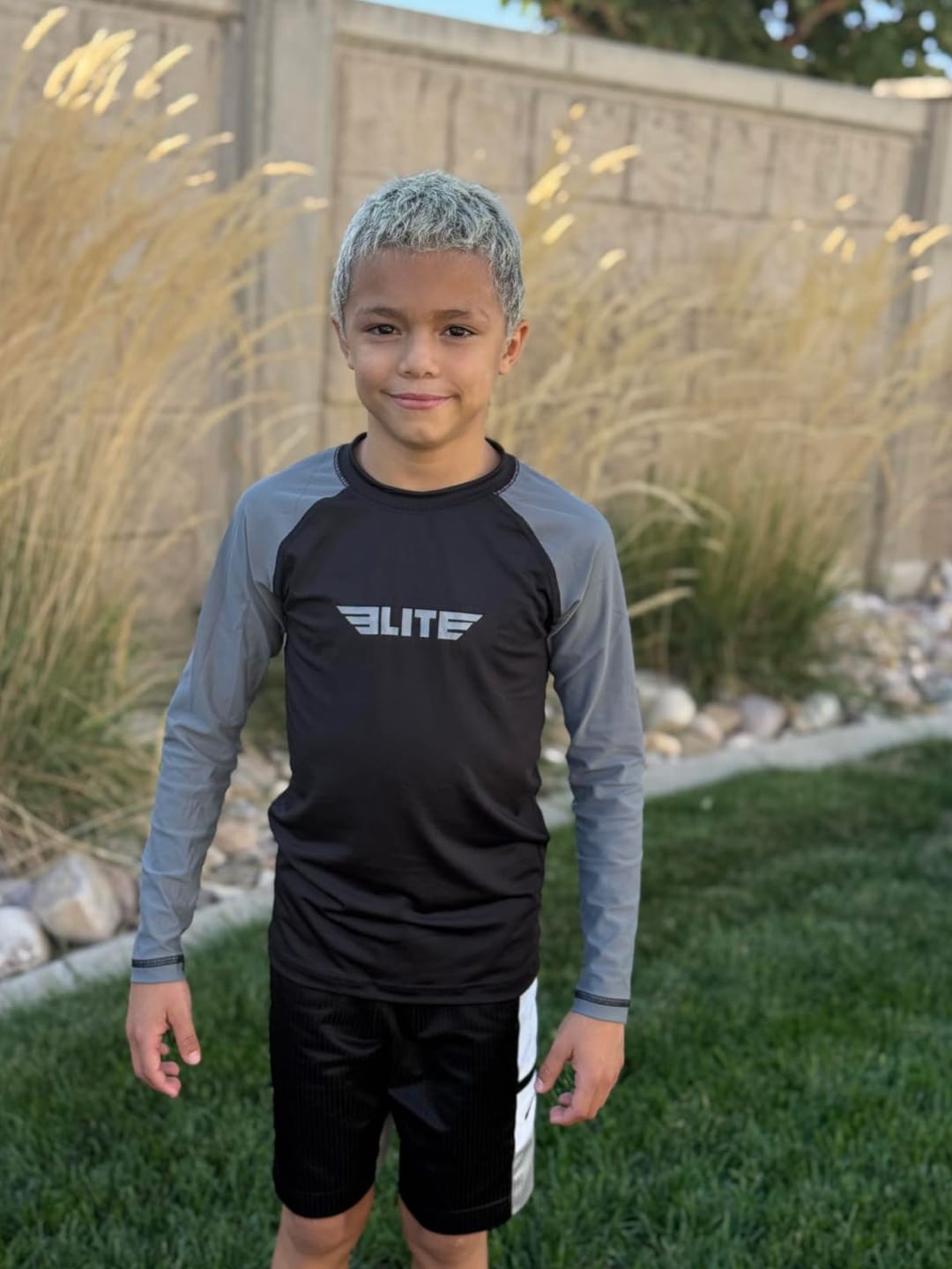 Customer photo review of Standard Gray Long Sleeve No-Gi Kids BJJ Rash Guard