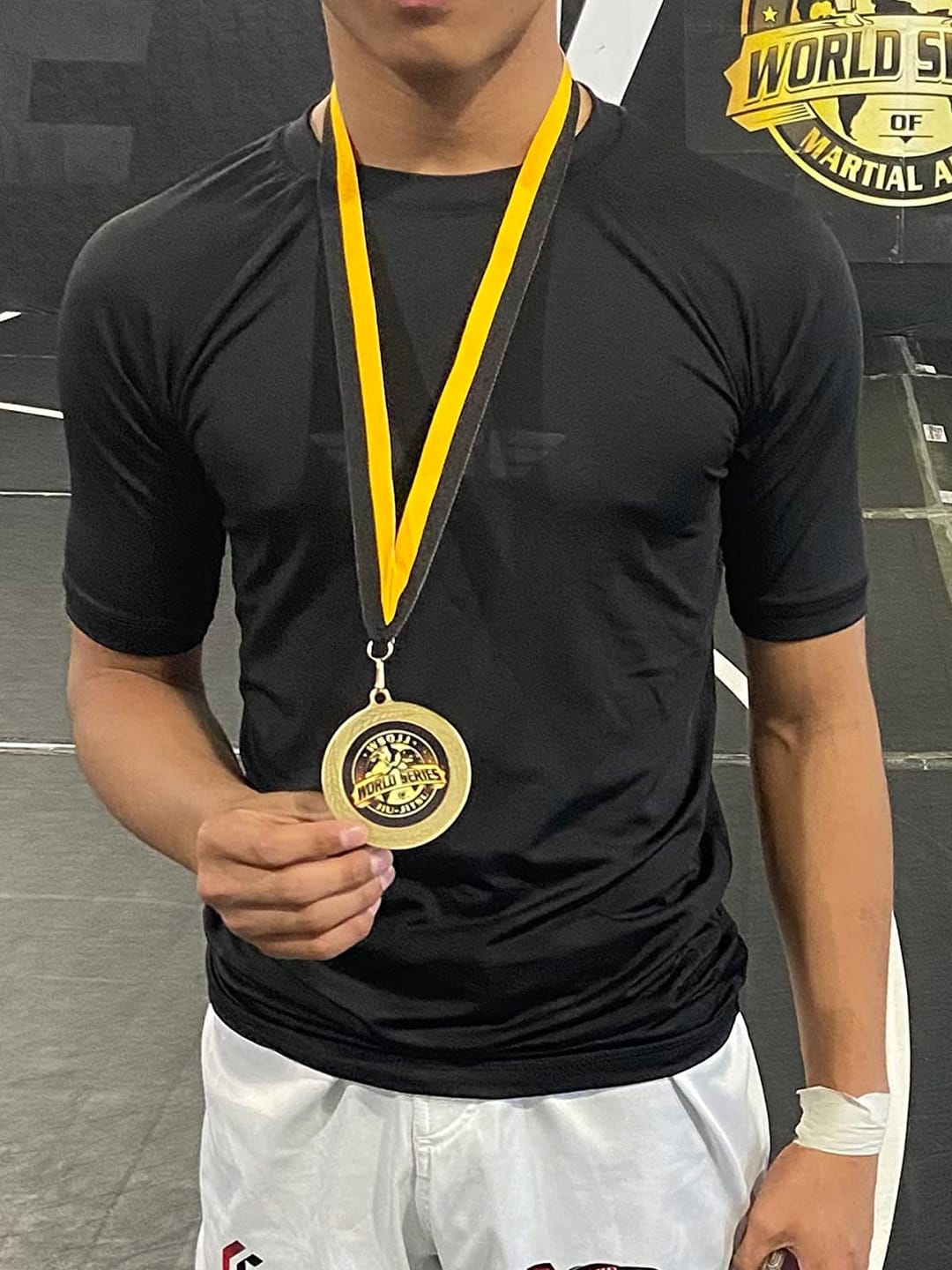 Customer photo review of Standard Black Short Sleeve No-Gi Kids BJJ Rash Guard