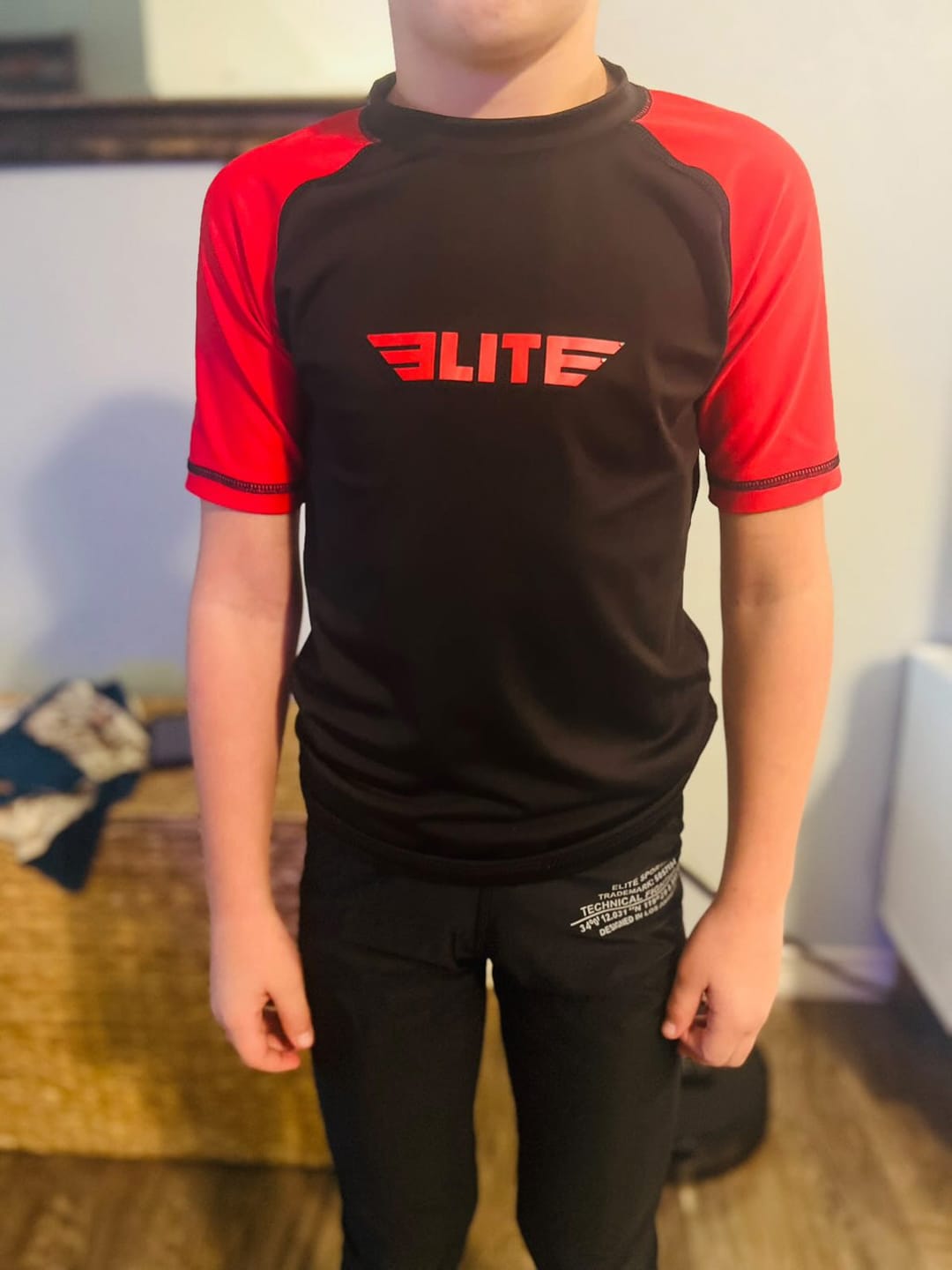 Customer photo review of Standard Red Short Sleeve No-Gi Kids BJJ Rash Guard