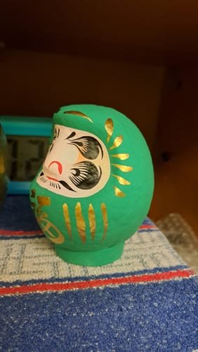 Customer photo review of Amuleto Giapponese Daruma Verde
