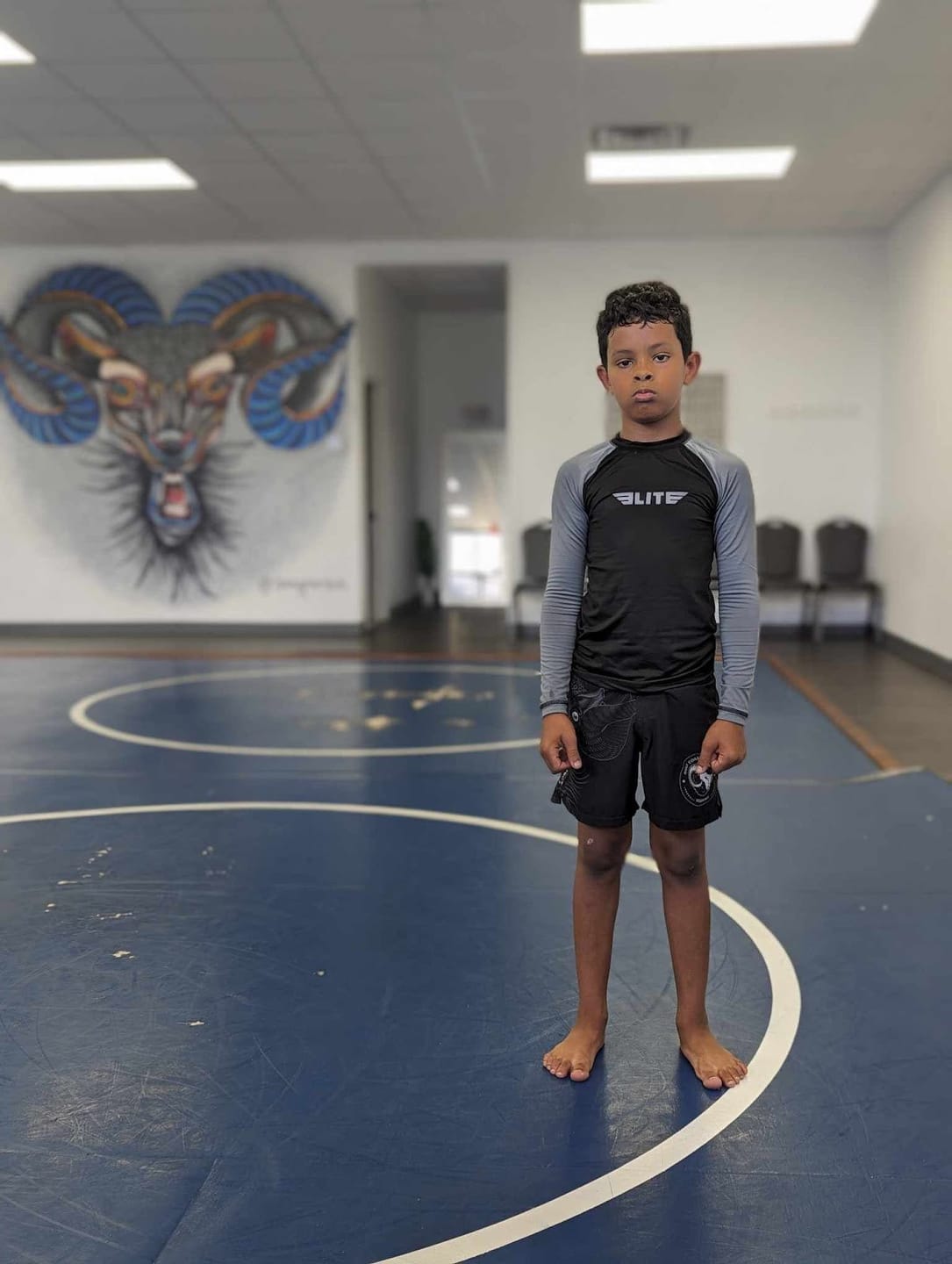 Customer photo review of Standard Gray Long Sleeve No-Gi Kids BJJ Rash Guard