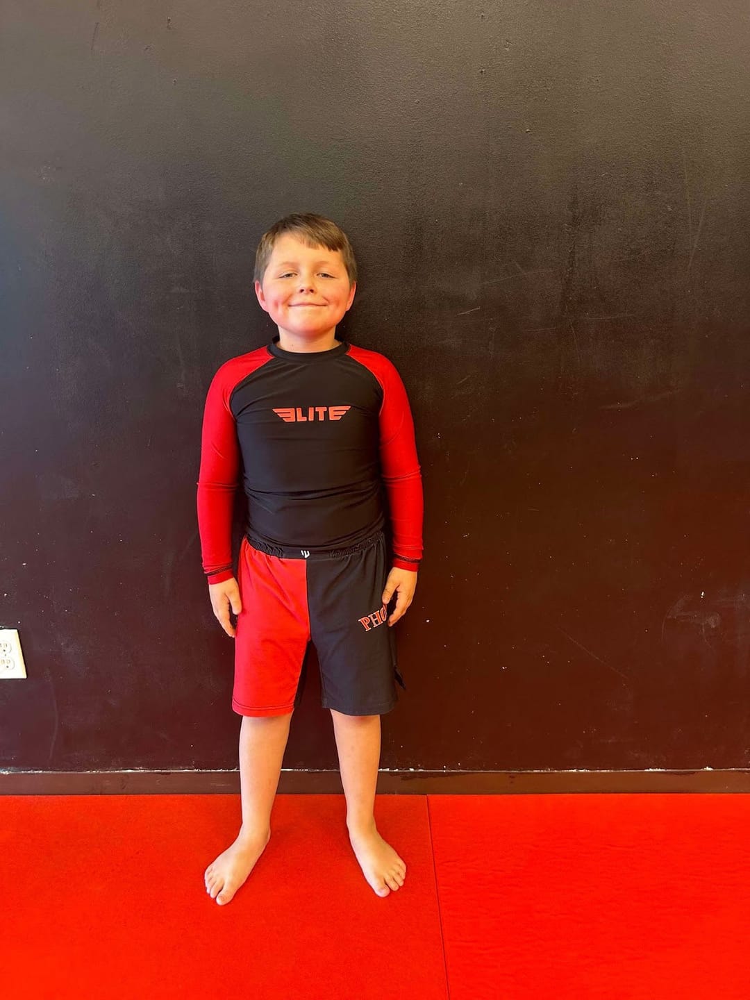 Customer photo review of Standard Red Long Sleeve No-Gi Kids BJJ Rash Guard