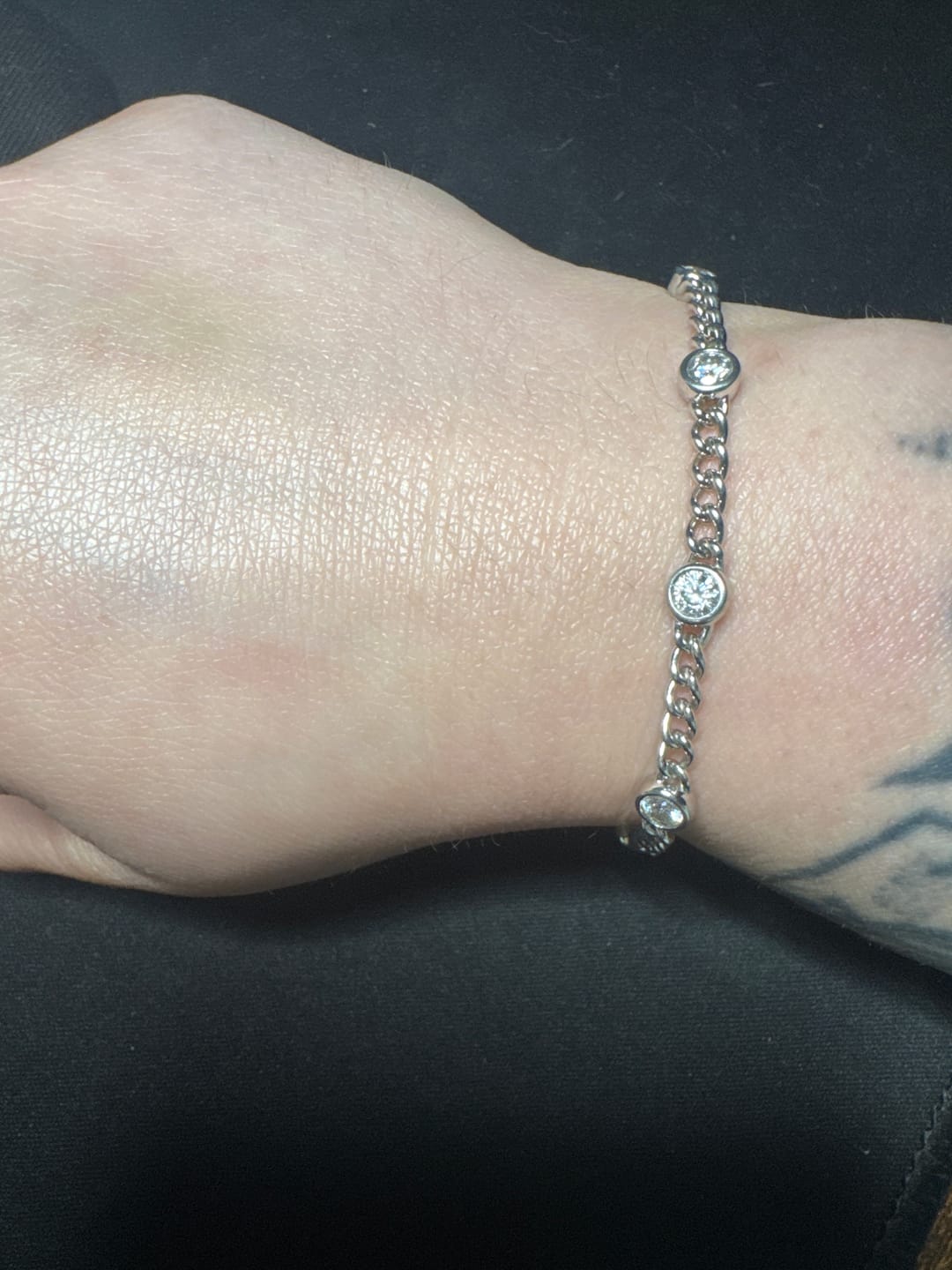 Customer photo review of Doveggs round bezel setting moissanite/lab grown diamond bracelet