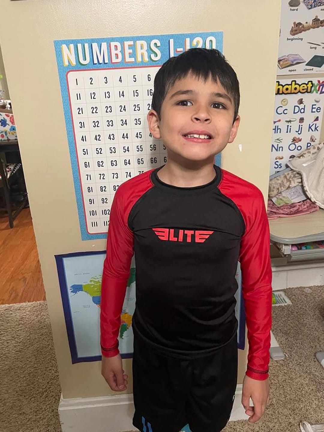 Customer photo review of Standard Red Long Sleeve No-Gi Kids BJJ Rash Guard