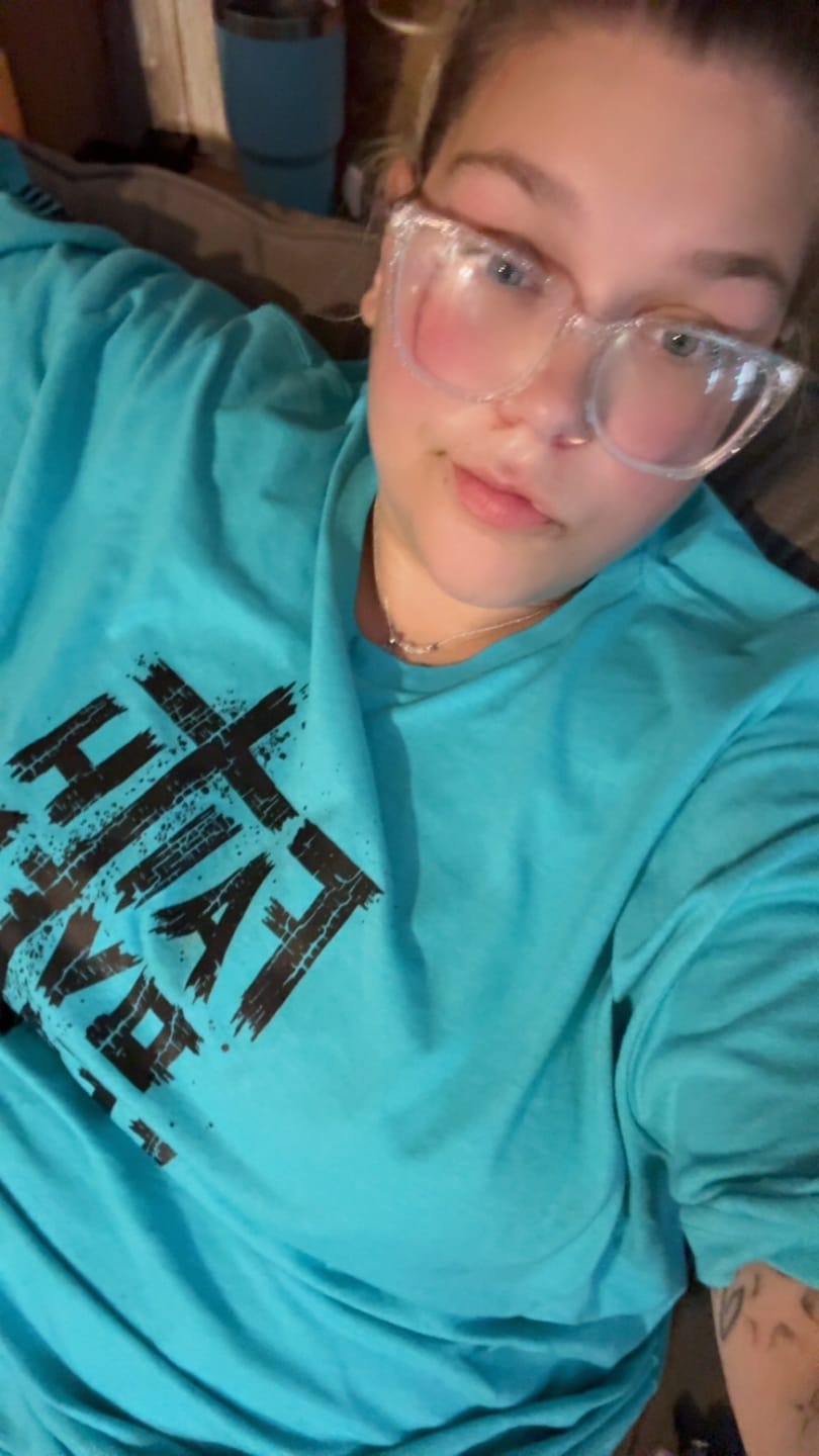 Customer photo review of Faith Over Fear Tee