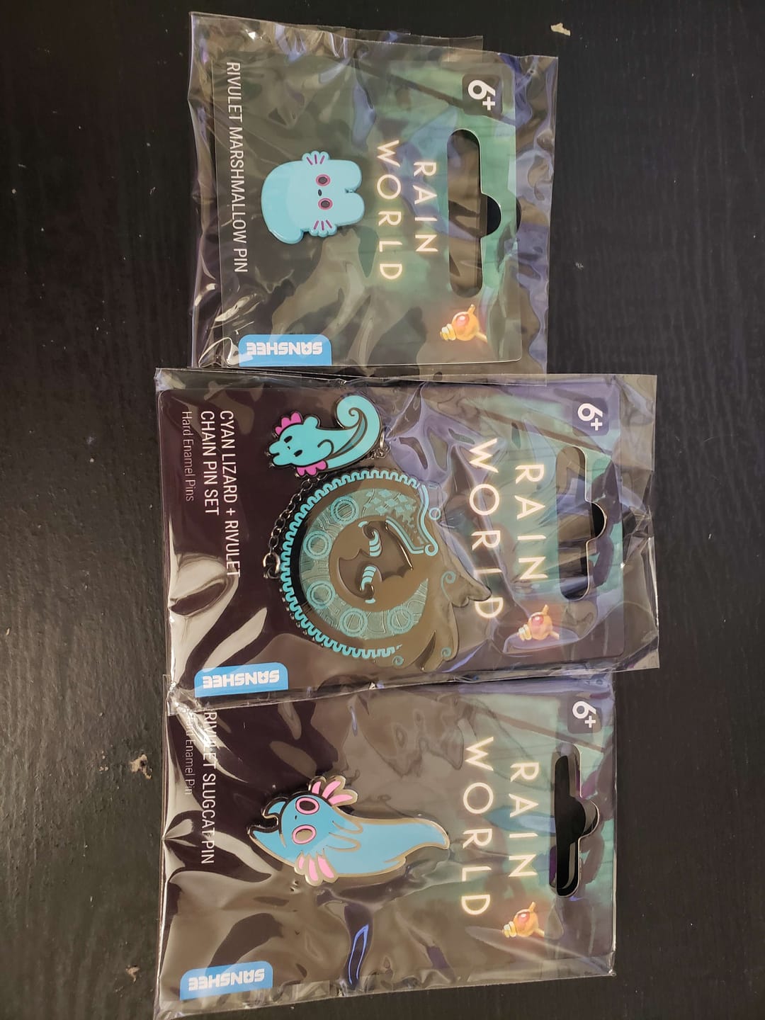 Customer photo review of Rain World - Cyan Lizard Hanger Pin