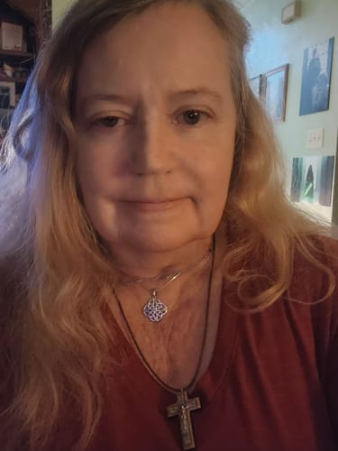 Customer photo review of Holy Land Olive Wood Pendant with Metal Crucifix