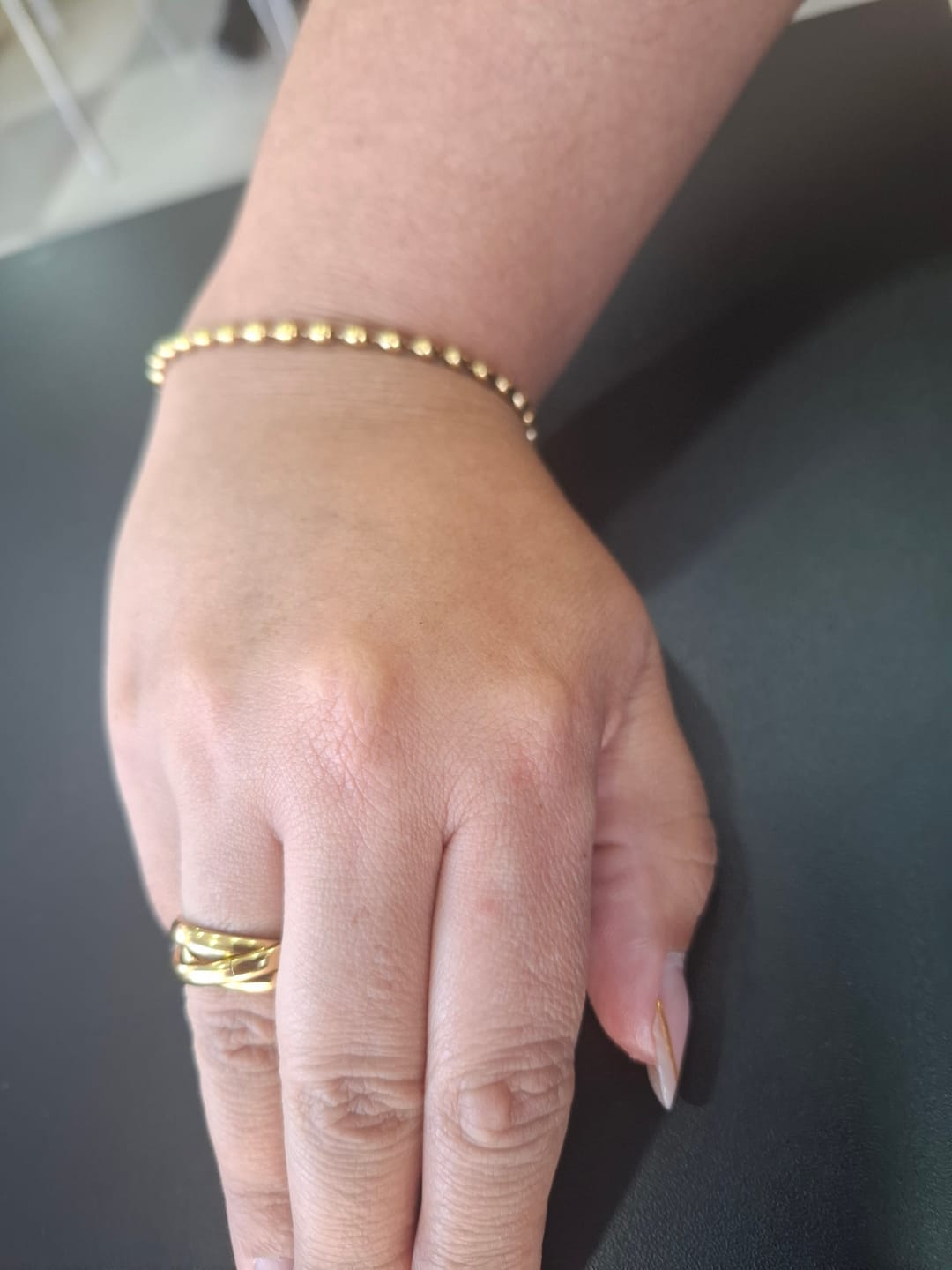 Customer photo review of Pulseira Corrente Esferas Banhado em Ouro 18K