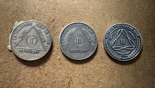 Customer photo review of 1 to 50 Year Bronze AA Meeting Chips - Sobriety Mint Infinity Triangle Recovery Medallions/Coins