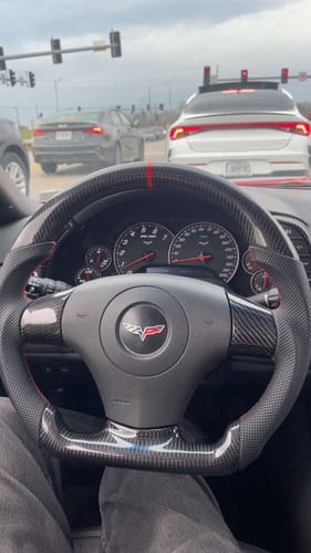 Customer photo review of Genuine Carbon Fiber Steering Wheel With Button Trim For C6 Corvette 2006-2011