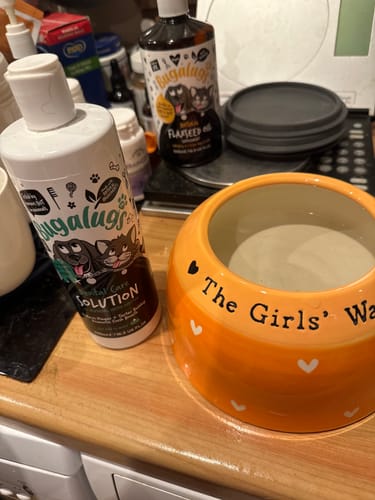 Customer photo review of Dental Care Solution Water Additive for Dogs & Cats