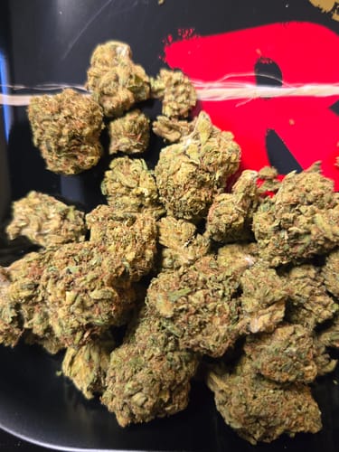 Customer photo review of Dank Push Pop THCA Flower