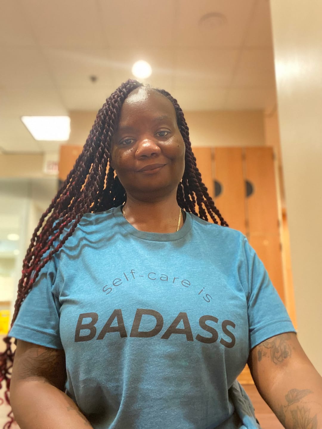 Customer photo review of Self-Care Is Badass T-Shirt