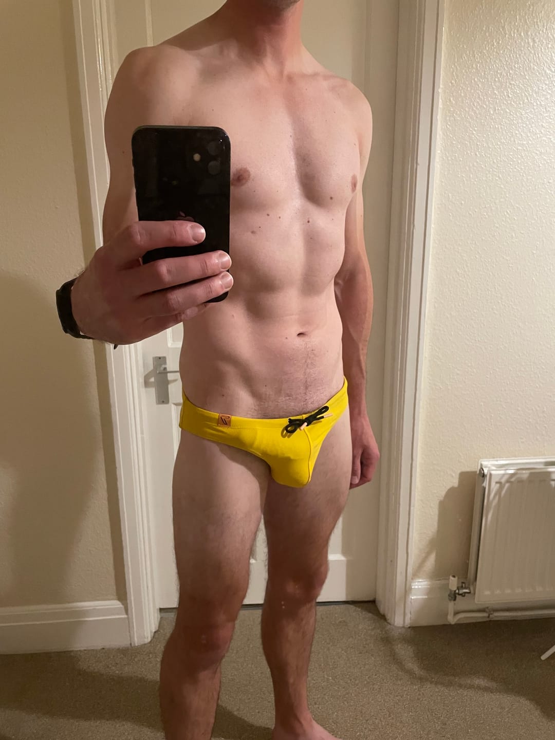 Customer photo review of Coral Yellow Swim Briefs