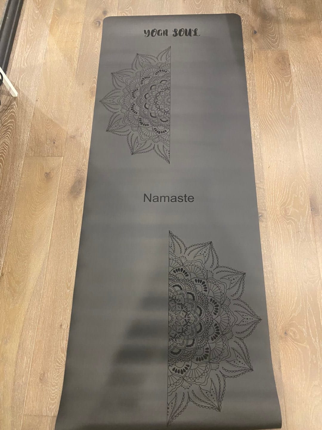 Customer photo review of PowerPro Yoga Mat | Black | Mandala + Strap