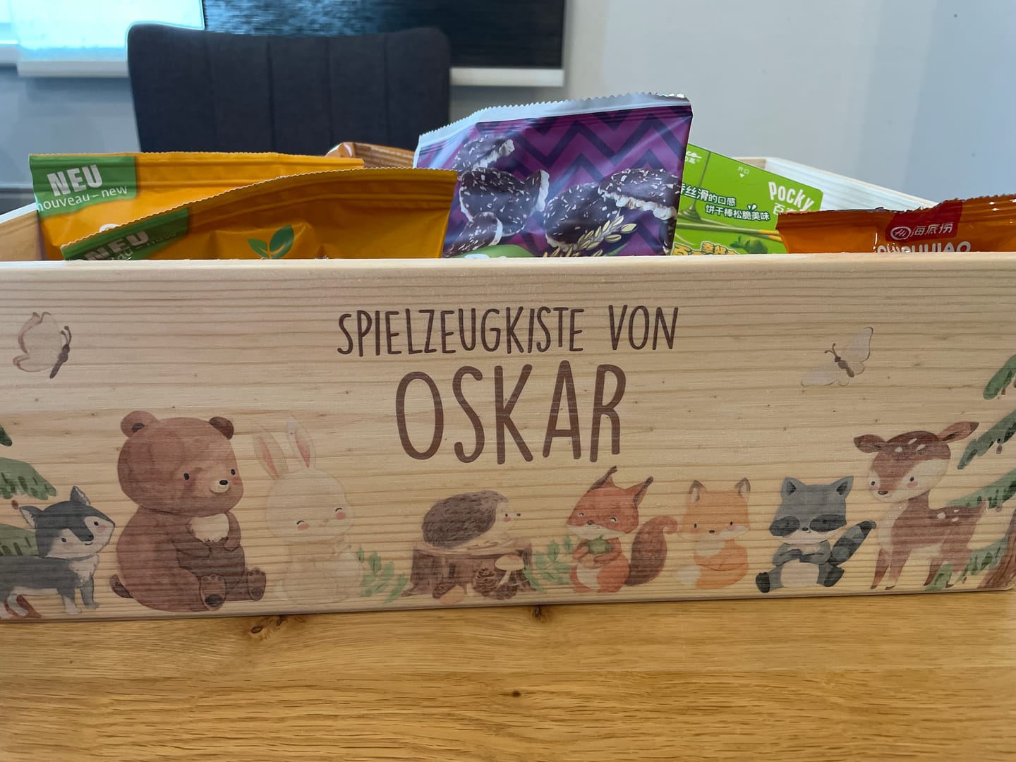 Customer photo review of Frühstücksbrettchen Holz personalisiert Fröhliche Tierfamilie