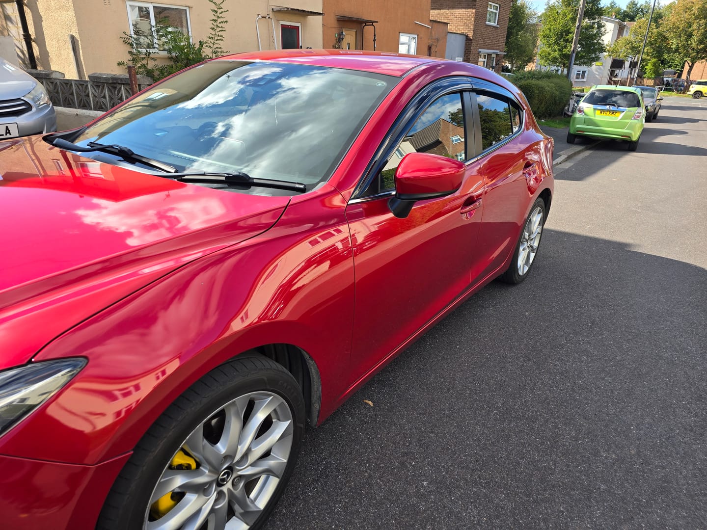 Customer photo review of Auto Clover Wind Deflectors Set for Mazda 3 2014 - 2018 MK3 (4 pieces)
