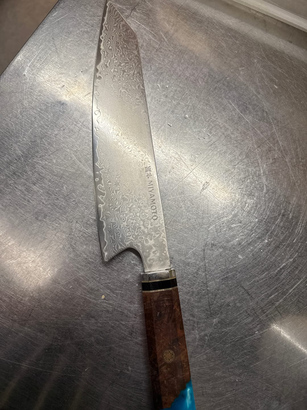 Customer photo review of Miyamoto Damascus Kiritsuke Chef Knife with Blue Resin Handle
