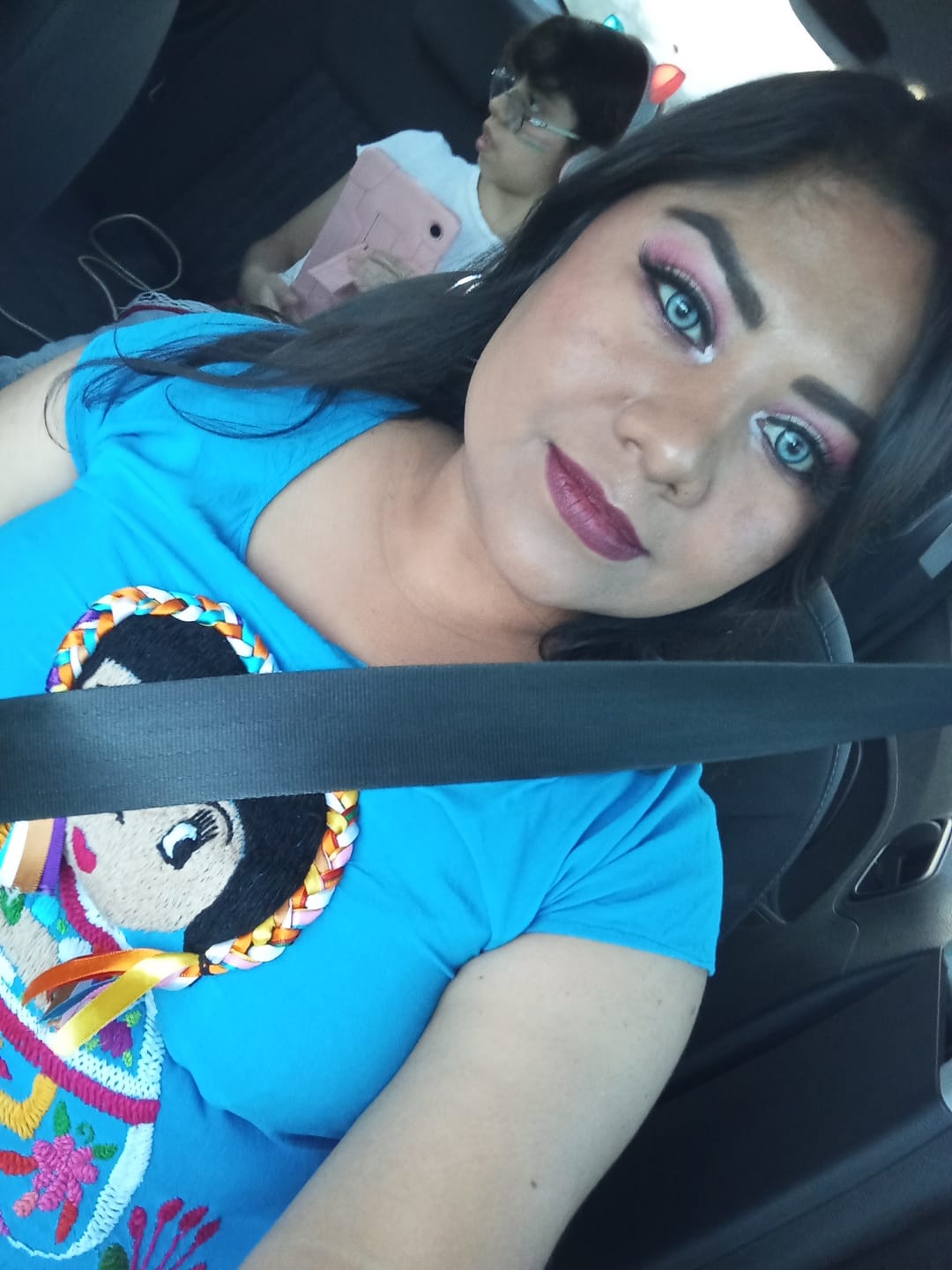 Customer photo review of Aine Swan Lake Blue Prescription Colored Contact Lenses