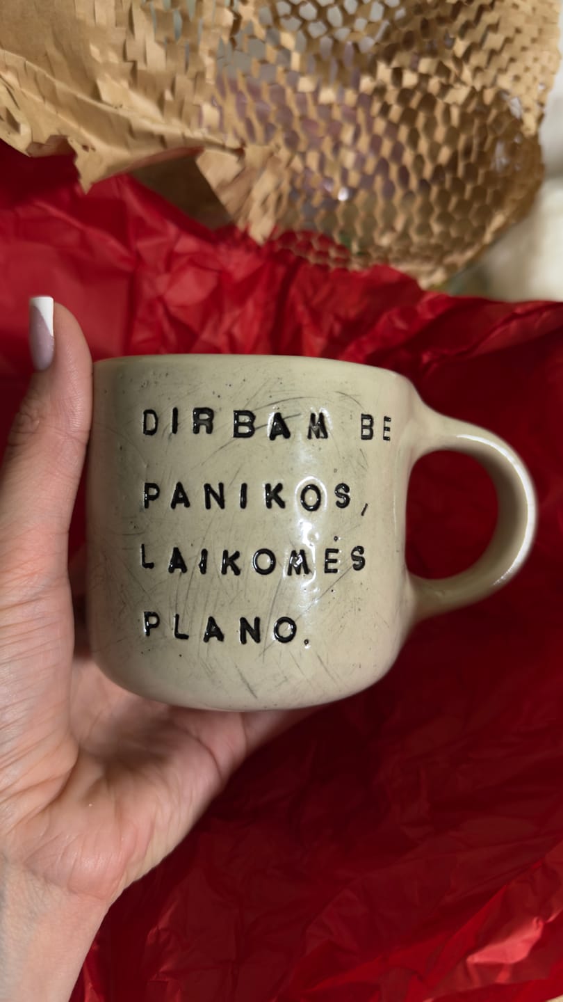 Customer photo review of White medium ceramic mug with words about work