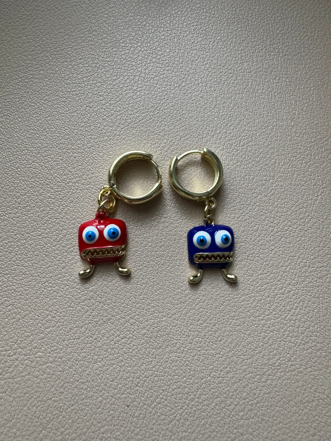 Customer photo review of Little Monster Evil Eye Charm RED – Laugh It Off