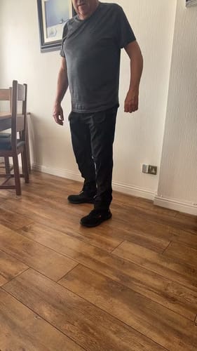 Customer wearing work trousers indoors