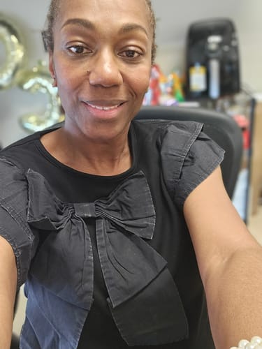 Customer photo review of Bow Accented Dual Flutter Blouse