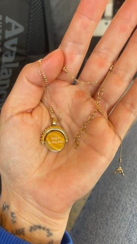 Customer photo review of Engravable Spinning Necklace