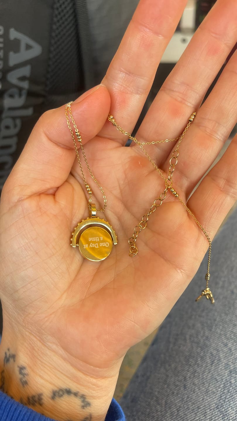Customer photo review of Engravable Spinning Necklace