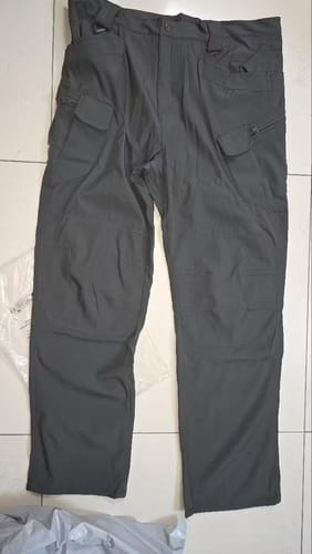 Work trousers laid flat on floor